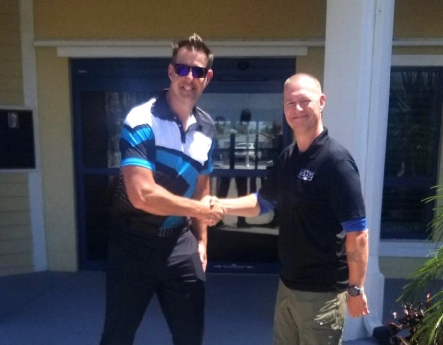 Pilot celebrating certification at USATS